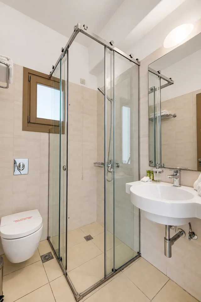 Suite 205 · Bathroom with shower