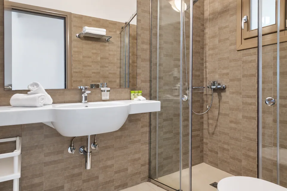 Suite 205 · Bathroom with shower