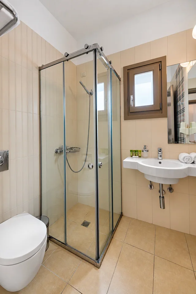 Suite 209 · Bathroom with shower