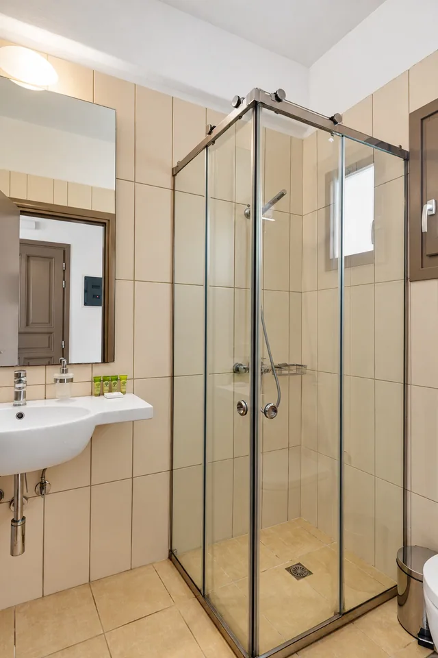 Suite 209 · Bathroom with shower