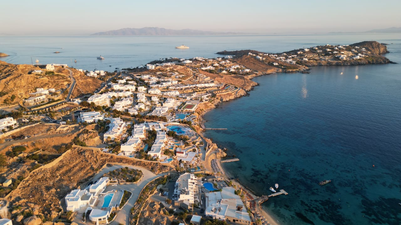 Aerial view of Agios Ioannis bay, beach and surrounding area in Mykonos
